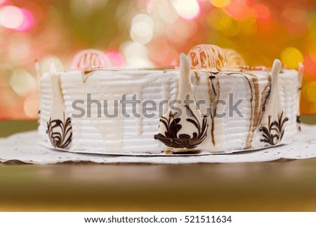 Homemade pie on yellow surface on colorful brighting background