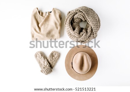 beauty feminine clothes arrangement with hat, mittens, sweater, scarf. flat lay, top view