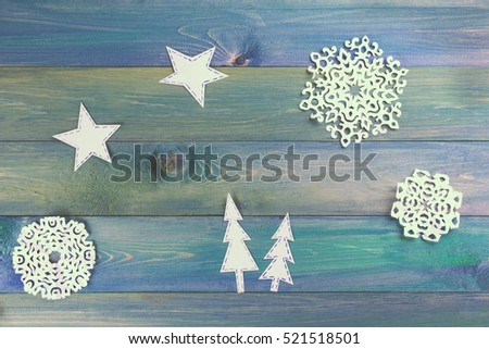 Christmas rustic background - vintage planked wood with Christmas fir tree and free text space. Christmas decoration snowflakes border on vintage grunge wooden board.background Winter holidays concept
