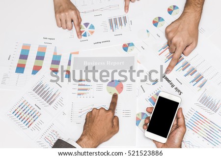 Business people hand pointing at business document in team meeting with blank screen smartphone in hand.