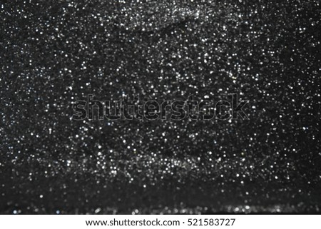 Silver glitter background black abstract Christmas.