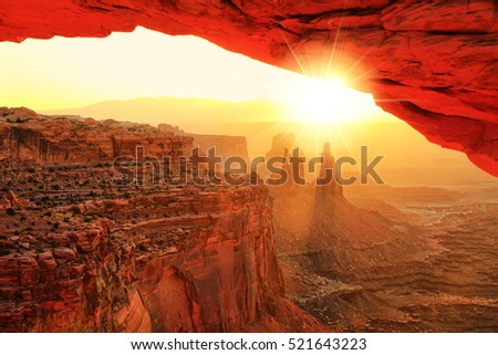 Glowing Mesa Arch at sunrise, Canyonlands National Park, Utah Royalty-Free Stock Photo #521643223