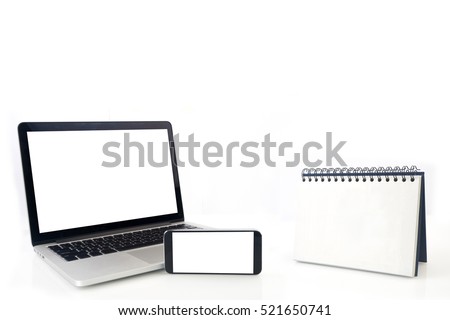 Desktop Loop wire binding book and blank screen of notebook ,cell phone, tablet, smartphone on isolated white background. concept of business connection.