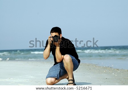 Male Photographer on beach