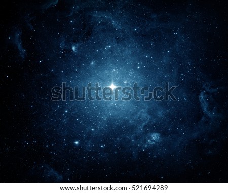 Universe filled with stars, nebula and galaxy. Elements of this image furnished by NASA. Royalty-Free Stock Photo #521694289