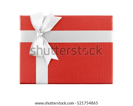single red gift box with simple white ribbon bow isolated on white background, flatlay close-up top view Royalty-Free Stock Photo #521754865