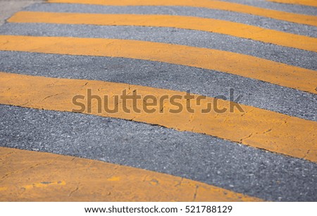 traffic safety speed bump on the road 