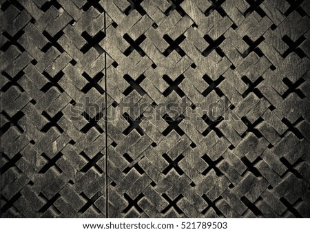 Carved wooden surface. Textured background. Toned.