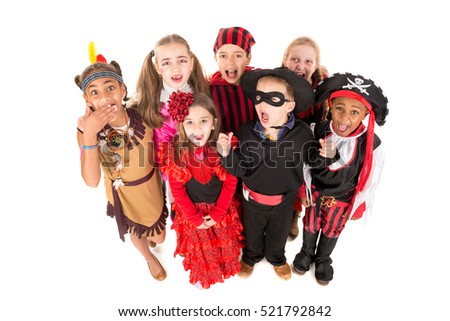 Group of kids in Halloween costumes isolated in white