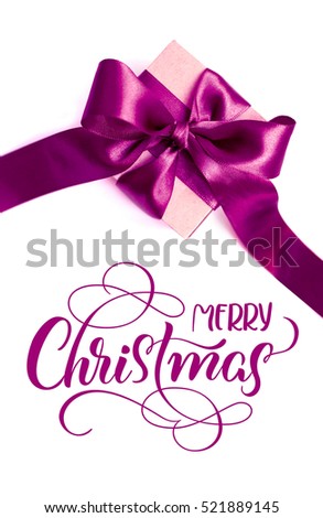 Gift box with purple bow on a white background and text Merry Christmas. lettering calligraphy