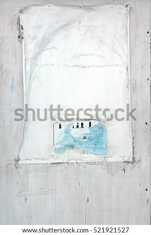 Old Urban Dirty Concrete Wall With Torn Worn Peeled Poster Abstract Vertical Background Texture. Abstract Creative Surface