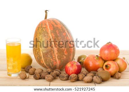 Autumn nature fruits concept. Fall fruits and orange juice, on a white background, studio picture