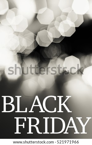 Abstract of black and white festive light background with word "Black Friday"