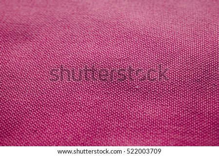 Pink fabric texture. Pink cloth background. Close up view of pink fabric texture and background. Abstract background and texture for designers.