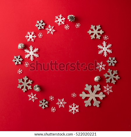 Creative arrangement of Christmas decoration on red background. Holiday concept. Flat lay. Royalty-Free Stock Photo #522020221