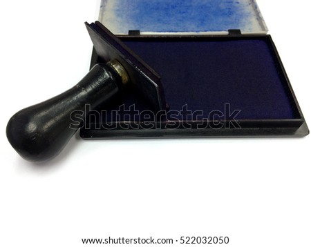 Old and vintage tamper with wooden handle blue color inkpad on isolated.
