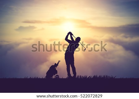 silhouette of golfers hit sweeping and keep golf course in the summer for relax time.Vintage color Royalty-Free Stock Photo #522072829
