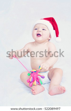 Baby with a Santa Claus hat
