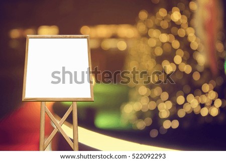 whiteboard with abstract christmas light night background