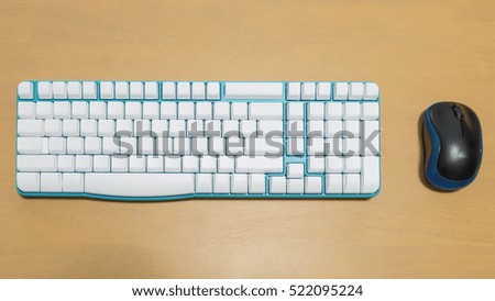 blank keyboard and mouse on wooden table