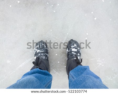 Feet on the ice.