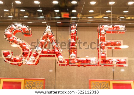 Bubble Sale mark sign hanging in front of department stores for Black Friday