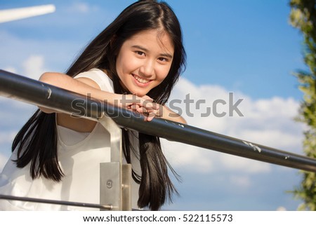 Portrait of thai teen beautiful girl happy and relax