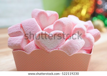 Happy Valentines Day candy with pink heart on box elegant light background
