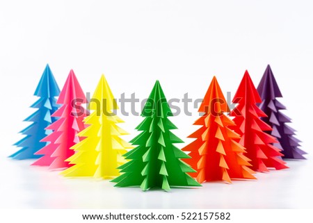 Colorful Christmas tree made of paper on white background