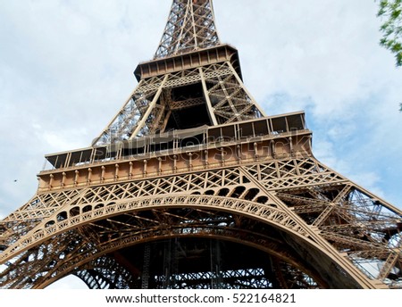The Eiffel Tower in Paris against blue sky. Spring in France Royalty-Free Stock Photo #522164821