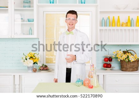 Chemist carries chemistry experiment in laboratory. Test-tubes with chemical reagent. Chemical Laboratory. Chemistry lesson. Study of chemistry. Scientist at laboratory.