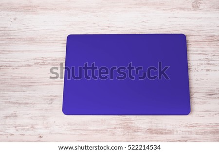 blue laptop on the desk