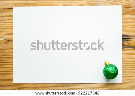 a single green Christmas ornament/bauble on a white background.