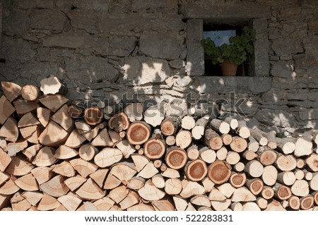 a pile of wood in a typical house in northern Italy