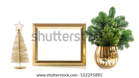 Golden picture frame with decoration and christmas tree branches. Holidays banner