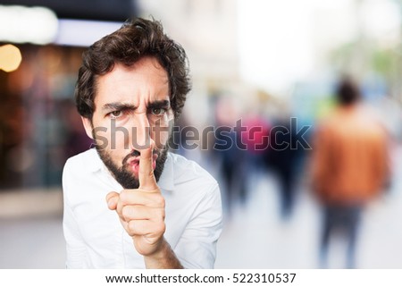 young funny man silence sign.disagree expression