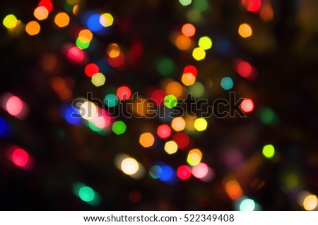 Abstract circular lights blurred bokeh holiday background of Christmas light