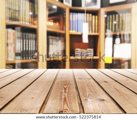 Wooden empty on bookshelf background.