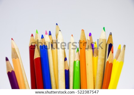 Back to school theme, colour pencil on white background