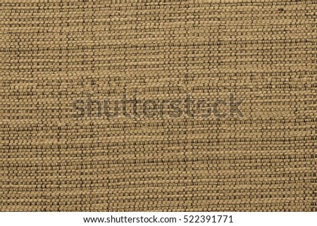 Gold and Black Weave Backdrop.  Closeup of a Burlap backdrop in tones of pale gold and obsidian black.
