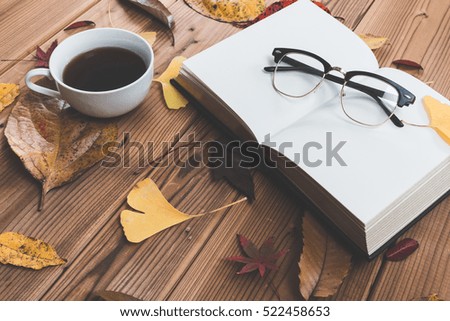 Reading and falling leaves