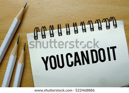 You Can Do It text written on a notebook with pencils