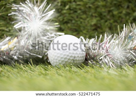 Golf ball with Christmas ornament for Christmas Holiday