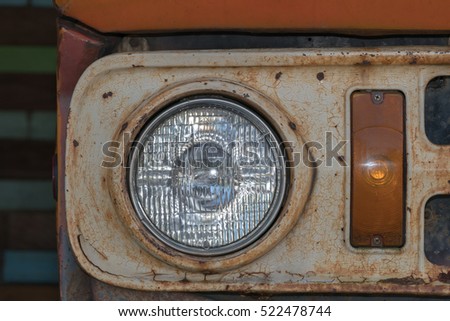 Vintage car,head light close up

