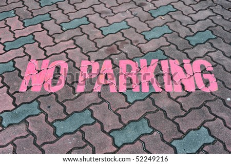 No Parking Sign On Pavement