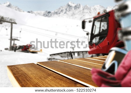 Wooden table for your decoration and winter landscape of mountains 