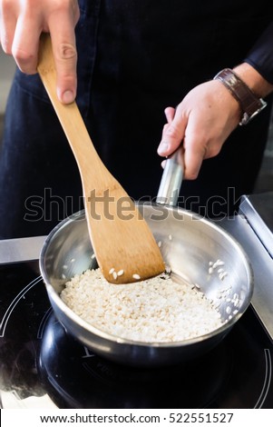 chef making risotto