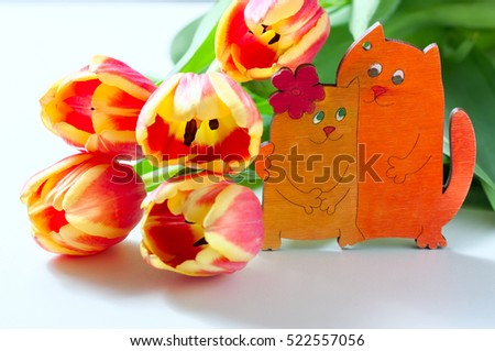 Orange tulips and cat kittens love heart valentine romance on white background. Selective focus