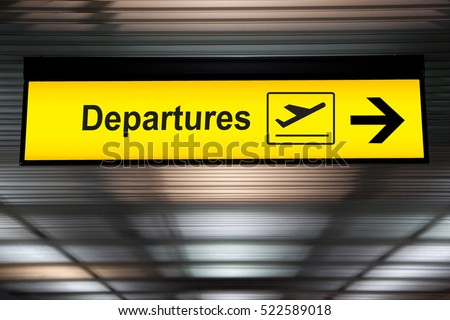 Airport sign departure and arrival board Royalty-Free Stock Photo #522589018