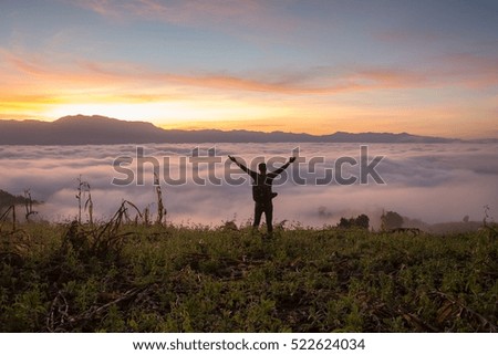 Nature photographer taking photos in the mountains
